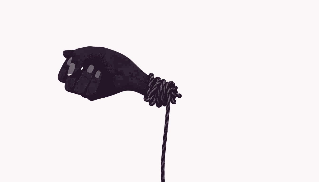 A person loosens a tight knot binding their wrist, fingers pulling the rope free.