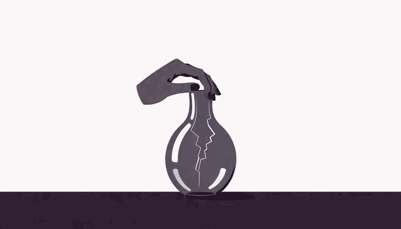 A single hand gently mends a cracked vase.